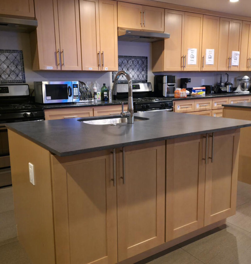 In 2025, HIF and vendor champion Smart Building completed a renovation project at AACI: Asian Woman’s Home, adding two kitchen islands along with an additional sink and disposal to meet the shelter’s need for increased cooking and prep space, storage, and improved flow during meal times. These improvements will significantly enhance safety and health for both residents and staff.